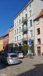 Duża kamienica w centrum starówki w Toruniu
