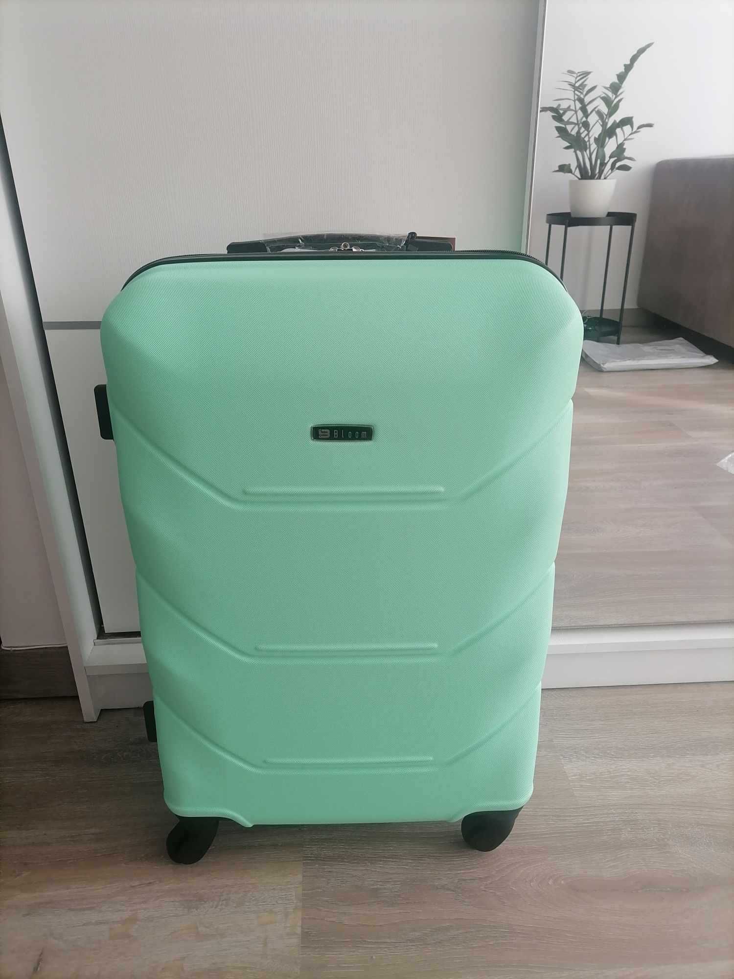 Walizka średnia XL kółka obrotowe nowa samolot