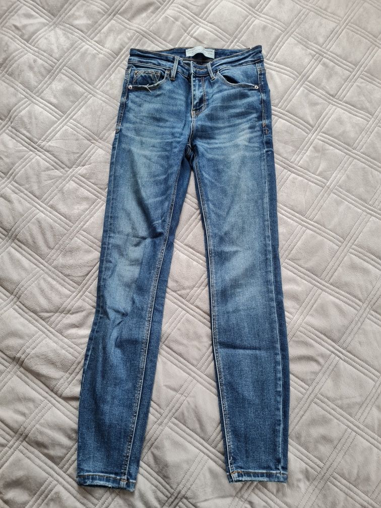 Spodnie jeansy 34 Stradivarius