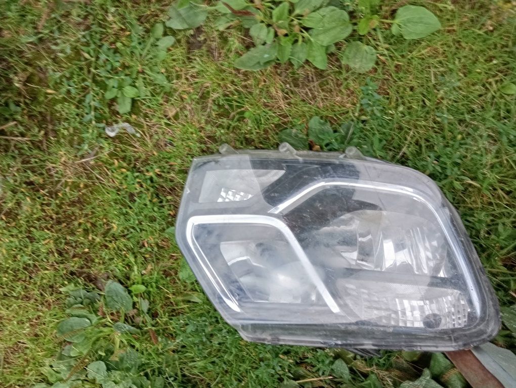 Lampa reflektor prawy przód Dacia Duster I 1 Oryginał Europa