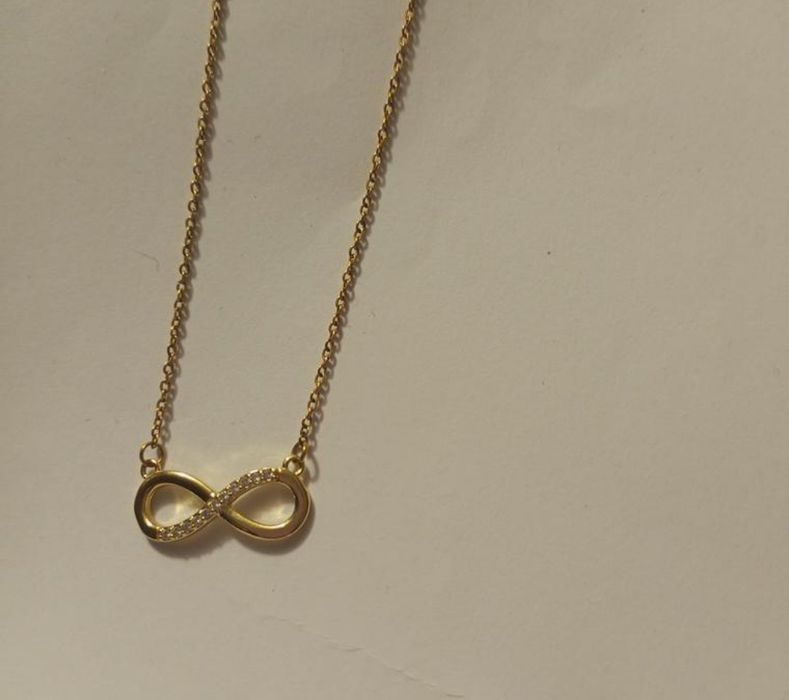 Кулон безкінечності + сережки на вибір