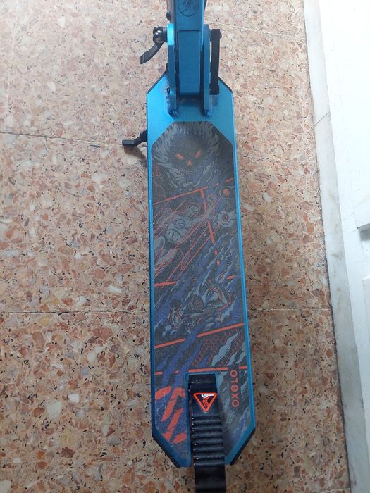 Trotinete  com travao oxelo