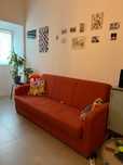 Sofá-cama três lugares laranja