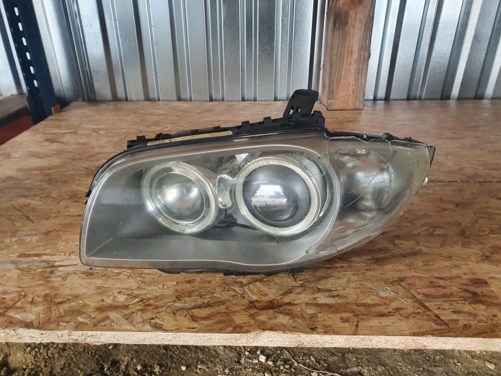 Lampa lewa xenon bmw e87 e81 bixenon Europa uszkodzona