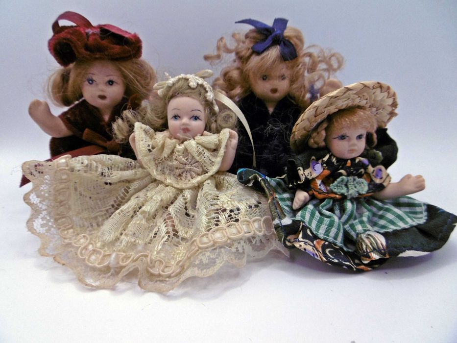4 Bonecas de Porcelana