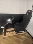 Fotel gamingowy - wyścigowy PLAYSEAT Evolution + stojak na kołach