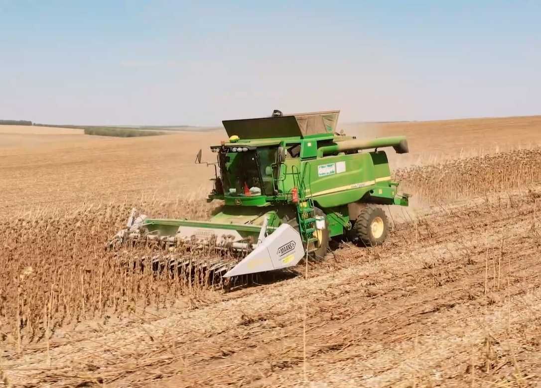 Жатка соняшникова Maans S під Клаас, Нью Холланд (Claas, New Holland).