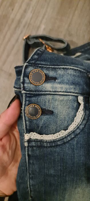 Ogrodniczki spodnie na szelkach z miękkiego jeansu z koronką KappAhl