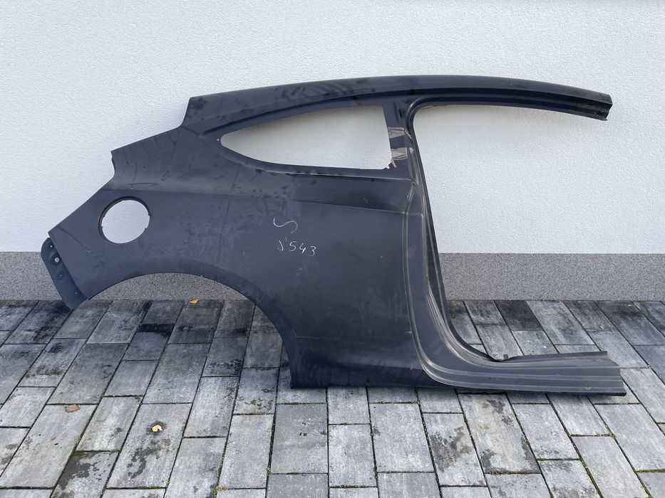 OPEL ASTRA GTC Błotnik tylny prawy