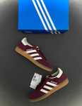 Shadow Red\Piłka ręczna\adidas\nowy UnisexTrampki.38