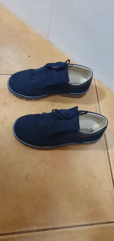 Par sapatos azul criança