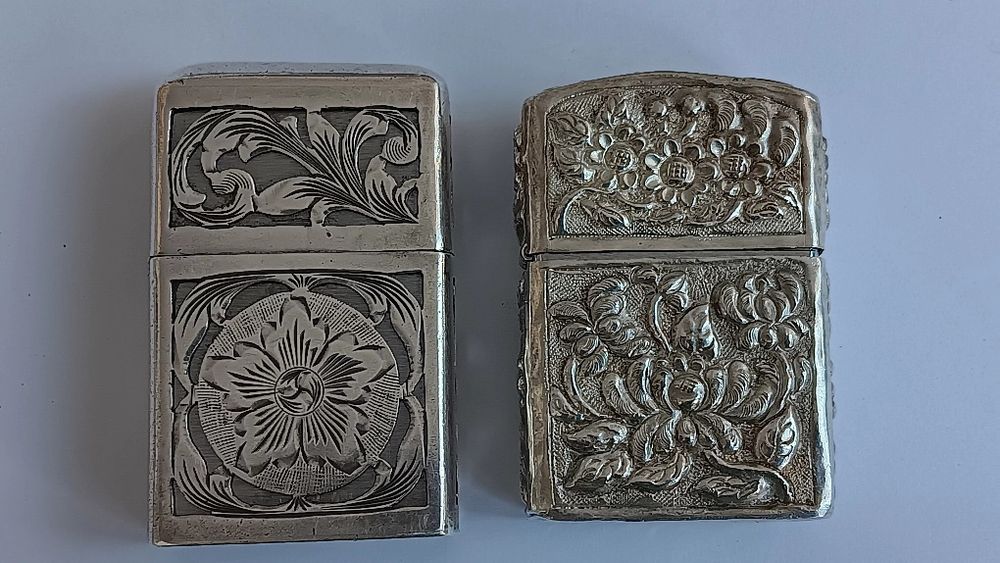 2 isqueiros da marca Zippo com caixa de prata