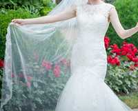 Piękna koronkowa suknia ślubna typu rybka