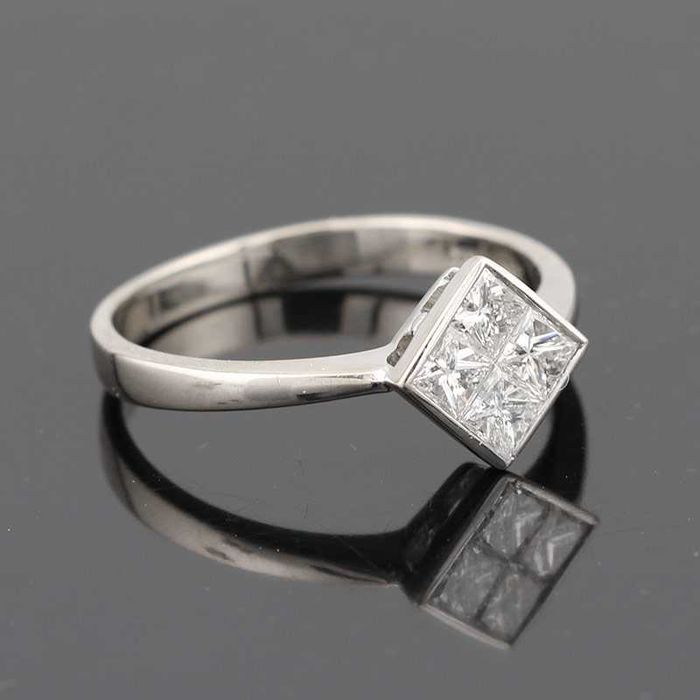 Złoty pierścionek z czterema diamentami 0.44ct białe złoto 18K
