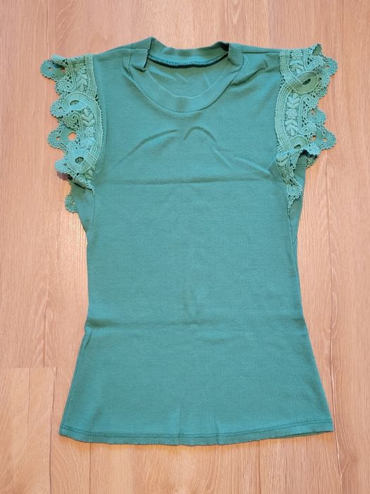 Miętowa bluzka z koronkowymi rękawami rozm 34
