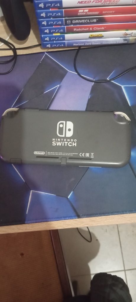 Nintendo switch lite e 4 jogos