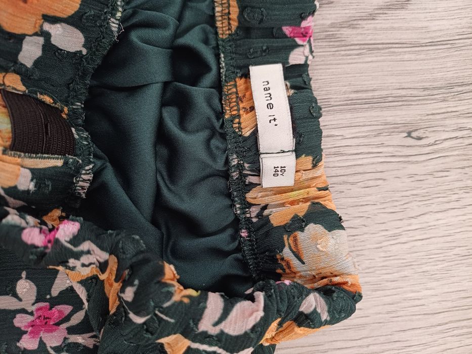 Spódniczka zielona w kwiaty r. 140