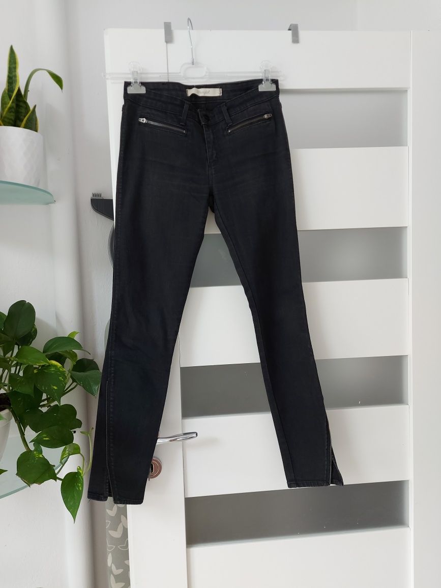 Spodnie Wrangler r. S czarne jeansy skinny ozdobne zamki