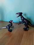 Figurki dinozaurów czarny Raptor oraz Indoraptor