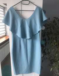 Błękitna sukienka pretty girl 40 L z falbana