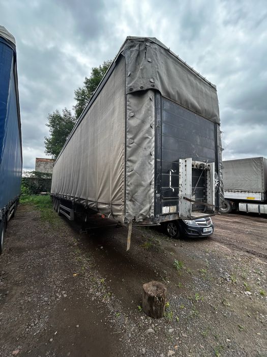 Загальний напівпричіп бортовий-тентований (SCHMITZ) до тягача