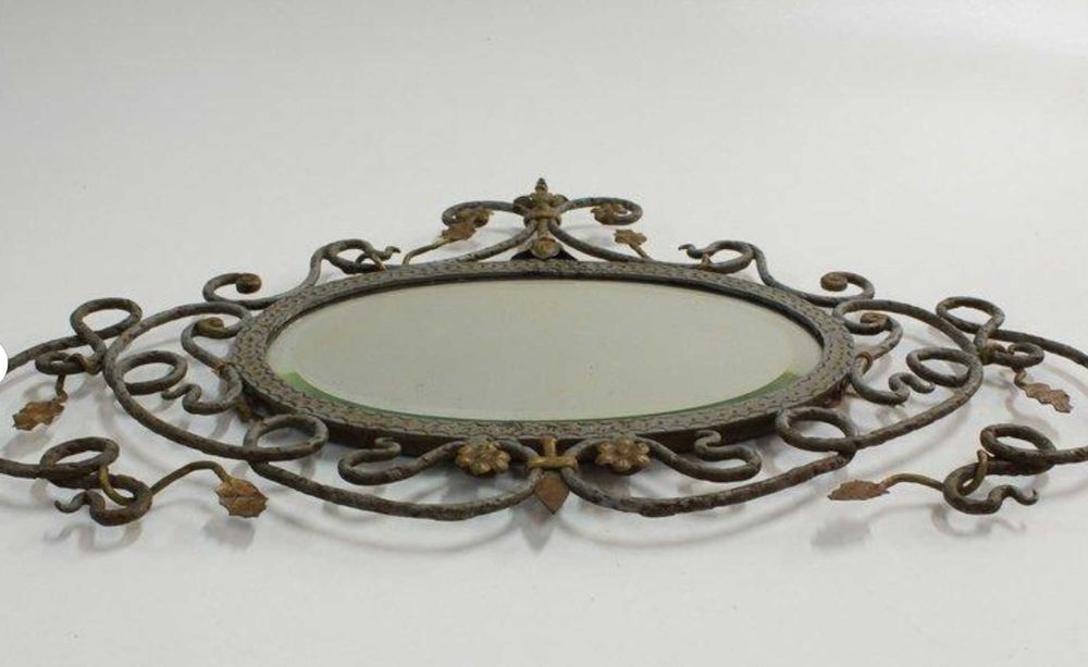 Espelho oval antigo de metal