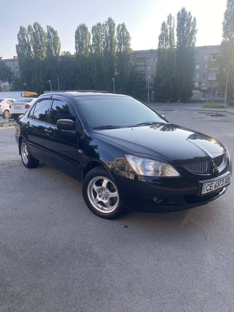 Lancer 1.6 механіка