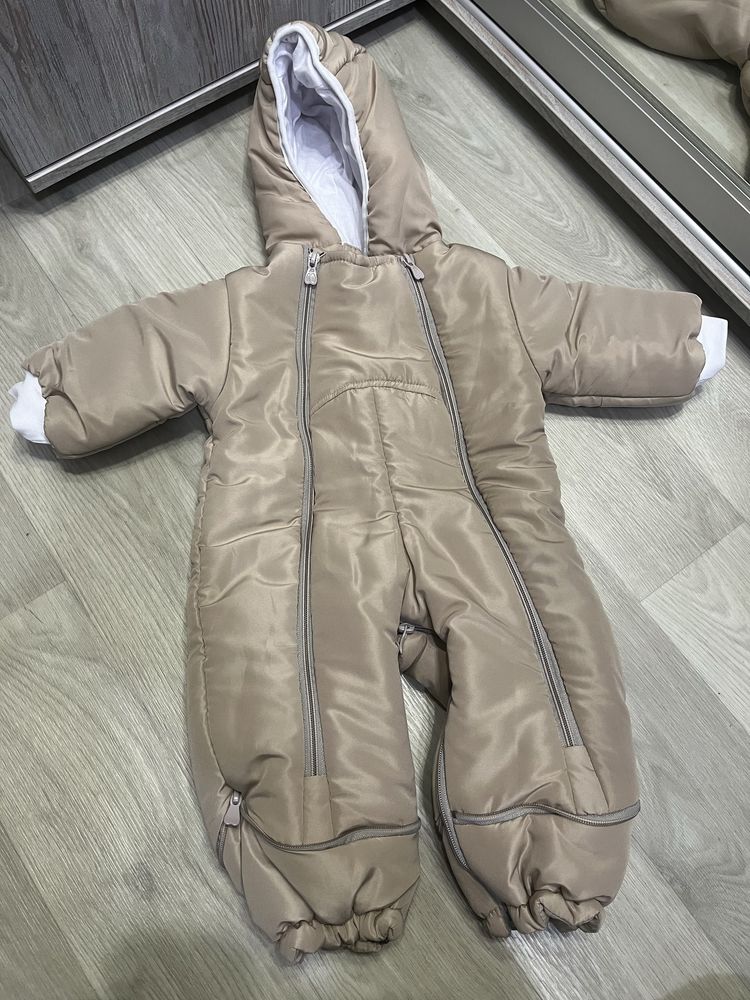 Продам новый комбинезон для малышей