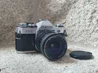 Canon AE-1 + lente FD 25-50mm f/4 (testada)