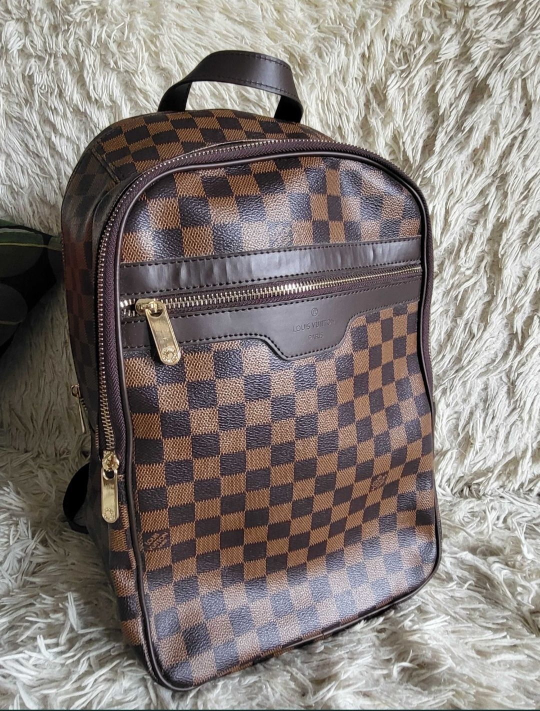 Mochila unisexo castanha