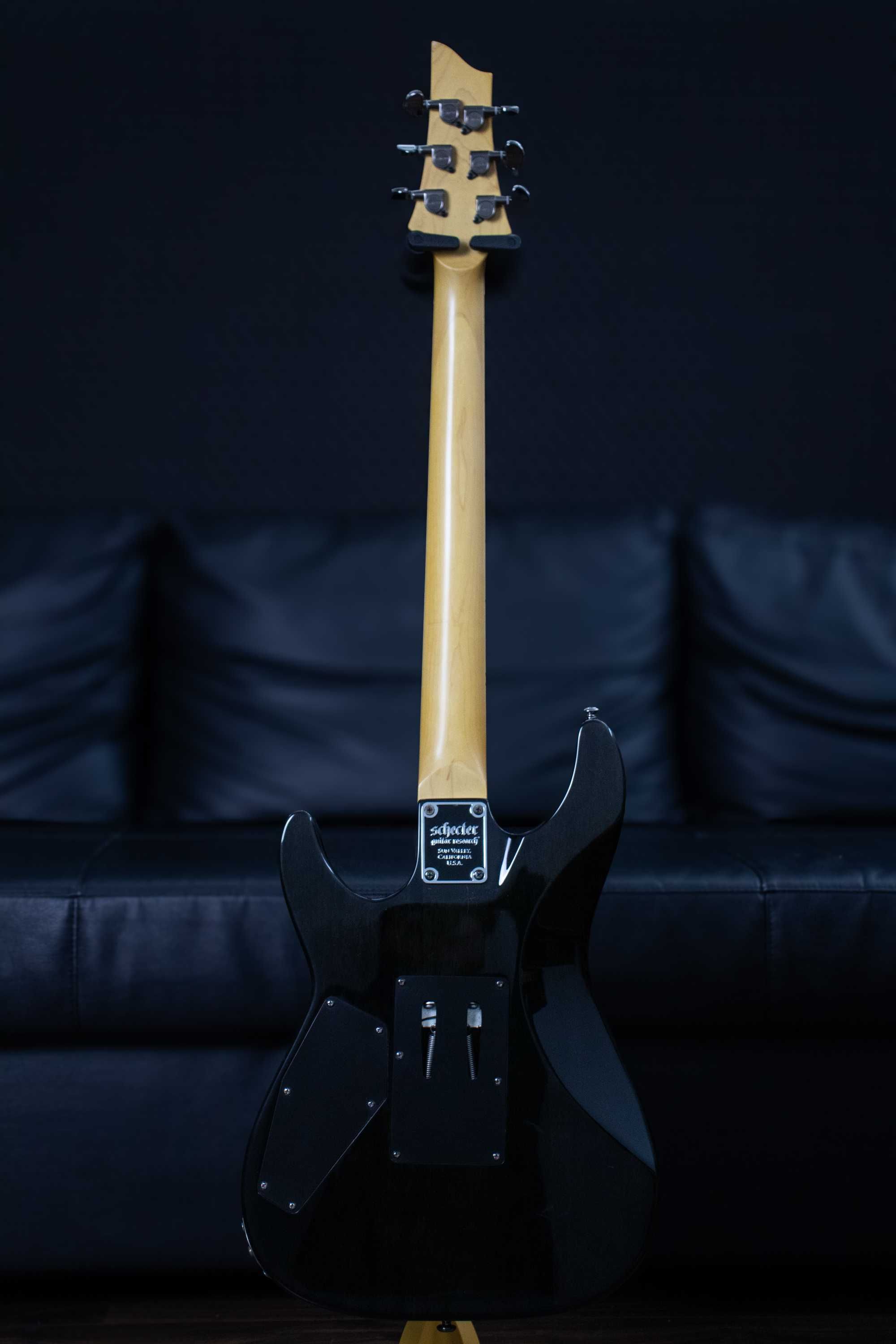 Schecter Omen Extreme-FR 2010 - See-Thru Black + Harshell Case