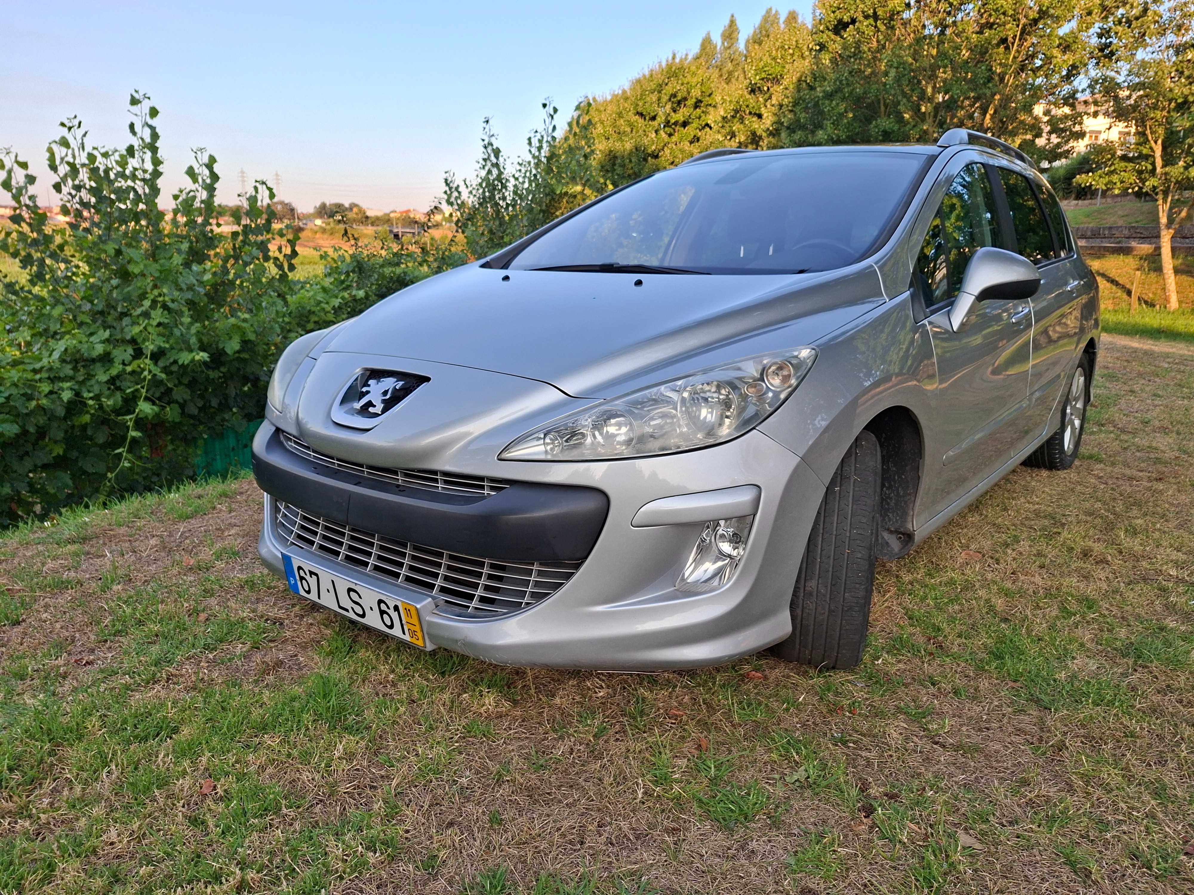 Peugeot 308 sw Hdi 7 lugares com teto