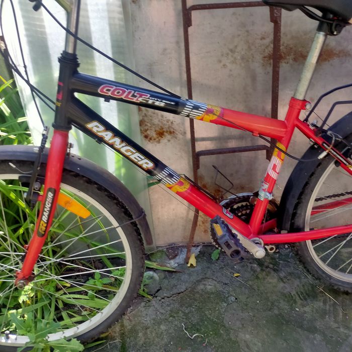 Велосипед rancer червоного кольору