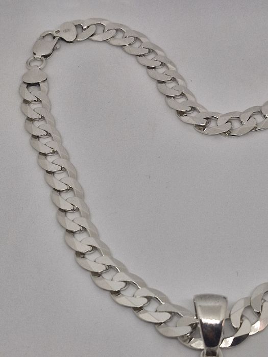 Piękny srebrny zestaw krzyż i figaro łączna Waga 67.30g