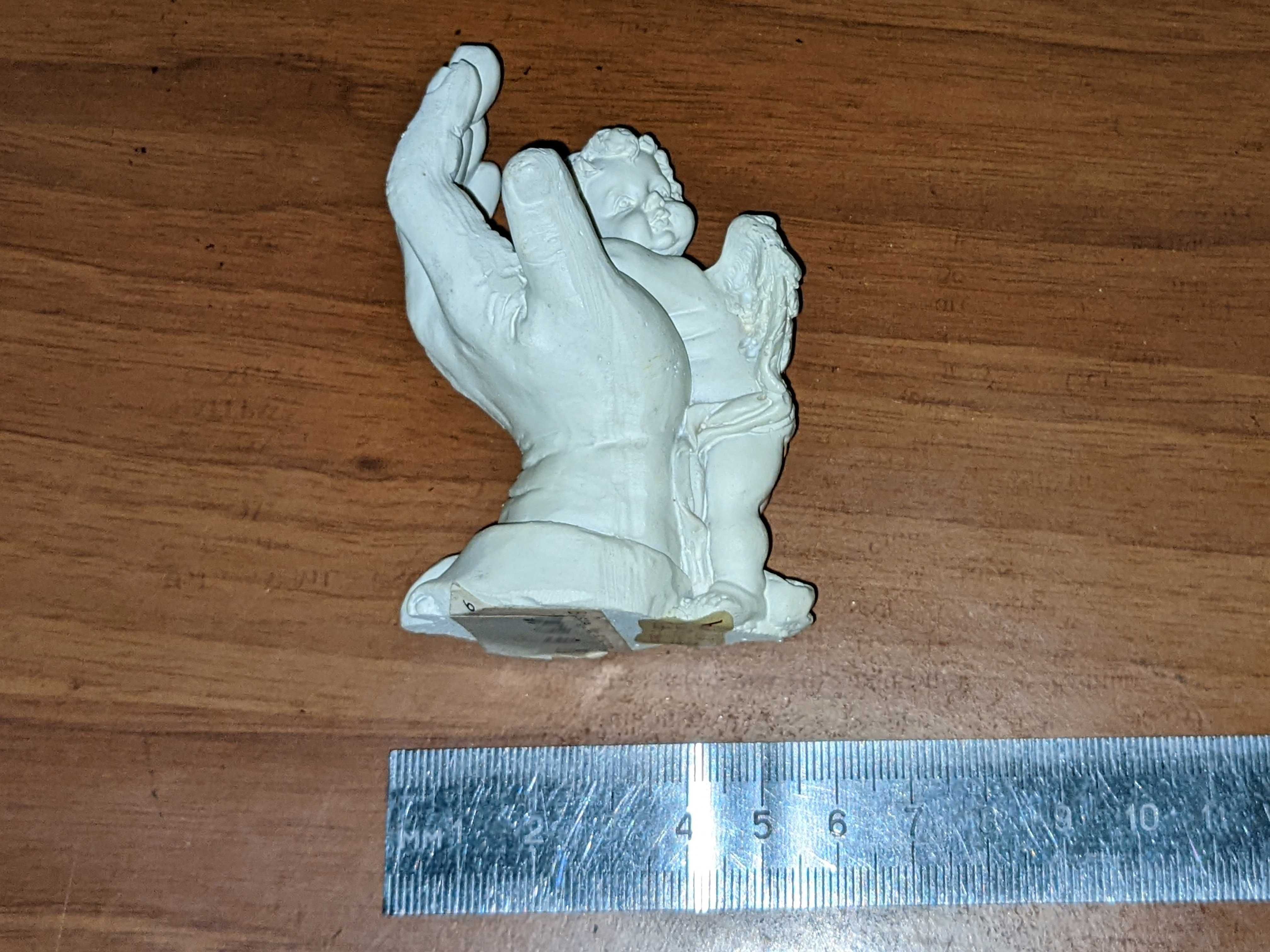 Статуетка Янголятко на долоні (Амур) 95х60х40 м кераміка Австрія