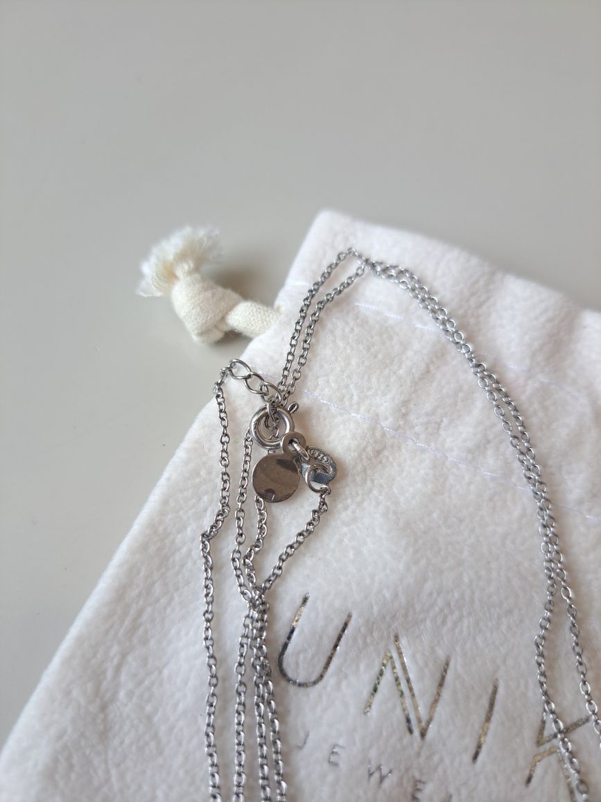 Colar Unike Jewellery - Prata 925, Pérola e Cristais
- Prata 925.
- Pi