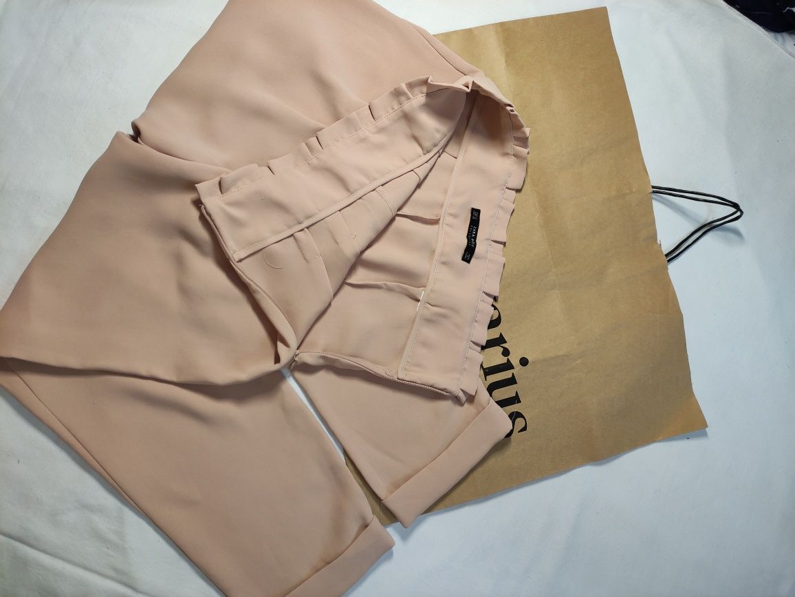 Жіночі бежеві штани вільного крою від Zara