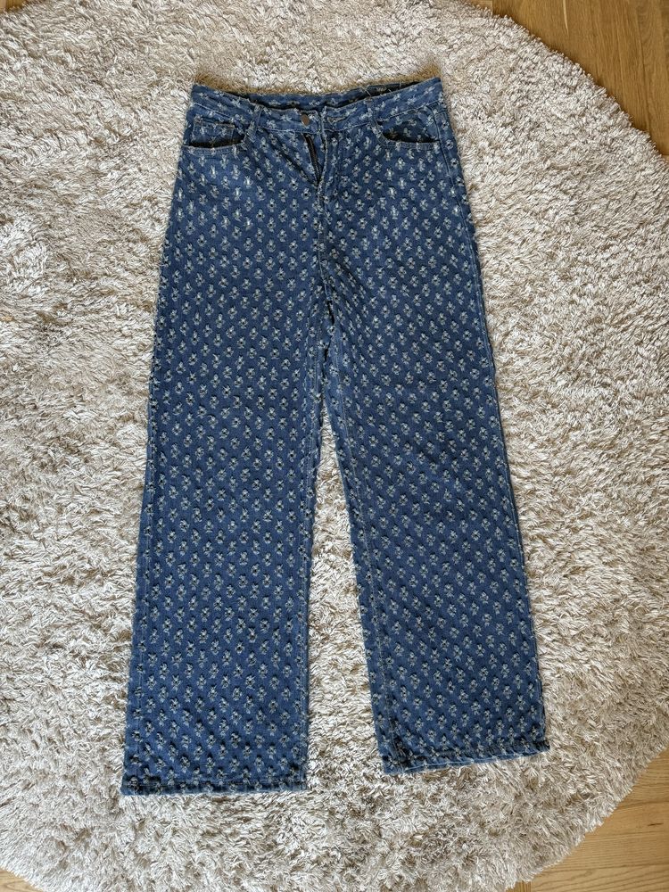 Модні джинси з перфорацією