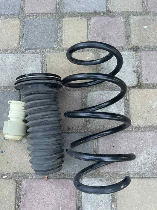 Пружина ліва, датчик abs, кронштейн кріплення фари Nissan rogue