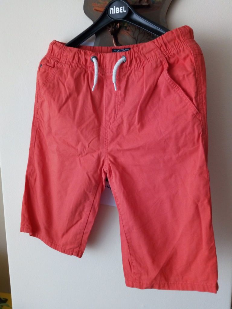 Bermudas laranjas de ganga