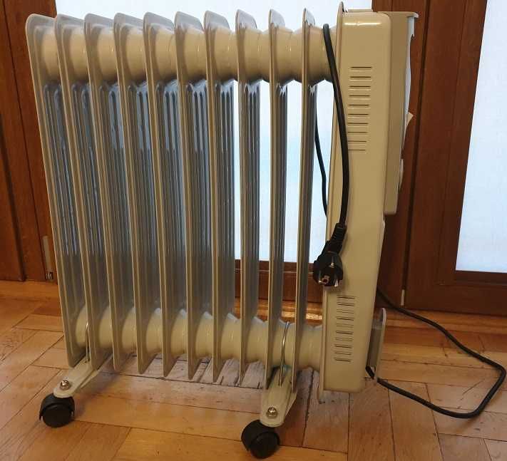 Polski, bezpieczny grzejnik elektryczny żeberkowy olejowy 220V / 2500W