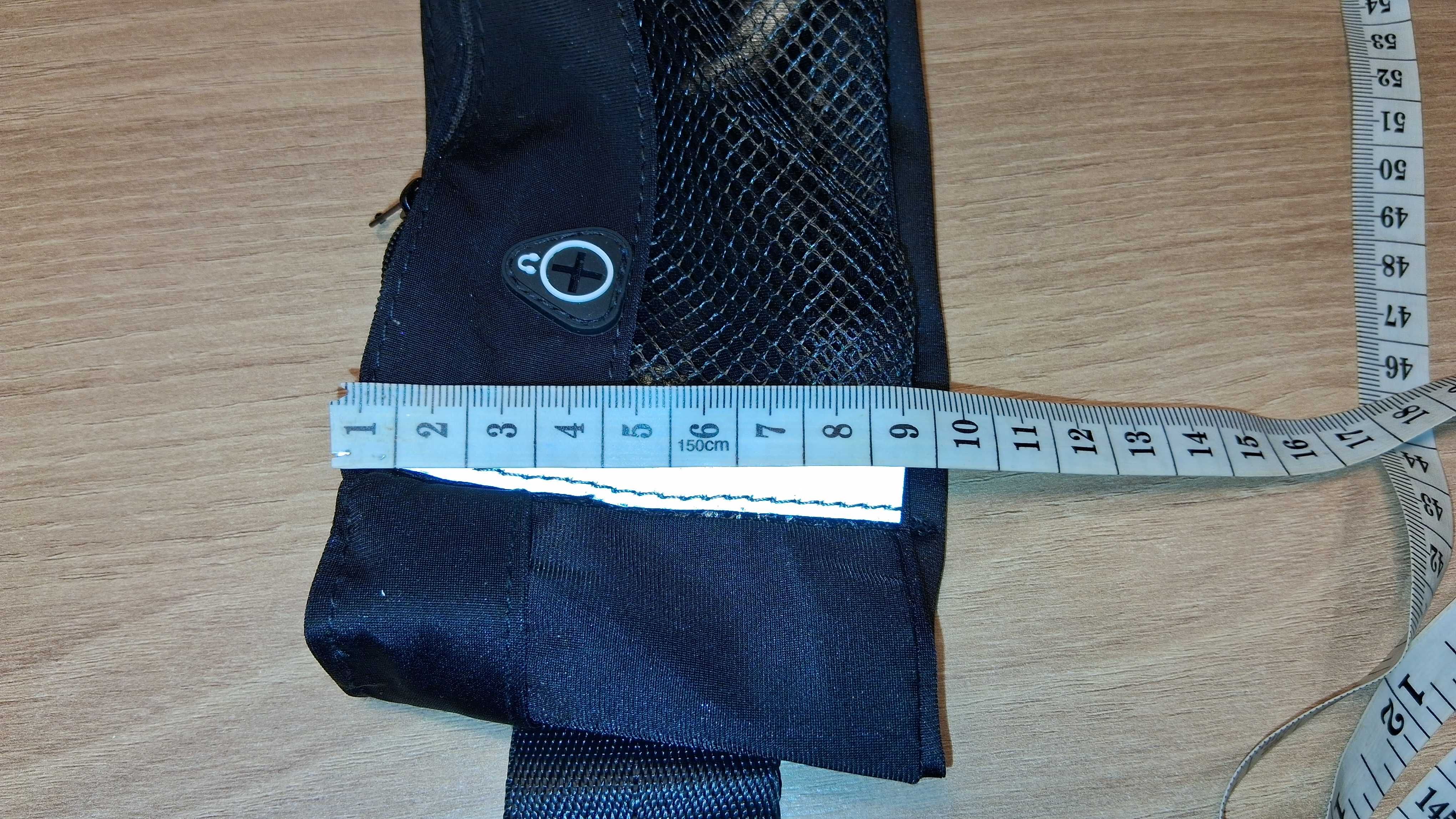 Sportowa Saszetka Na Pas Z Odblaskami I Otworem Na Kabel Słuchawkowy