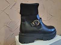 Buty na wysokim podbiciu 39