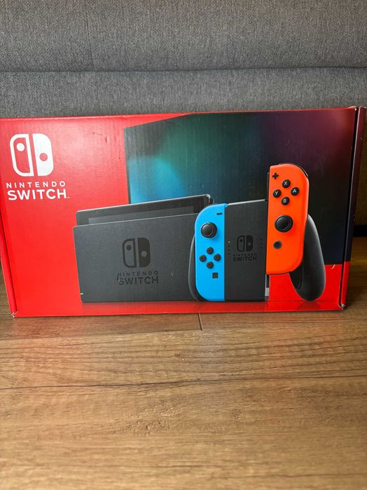 Konsola Nintendo Switch + Pad do Joycon'ów + Dock Station