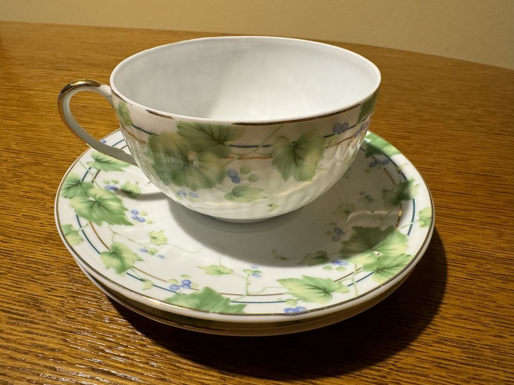 Pozłacana porcelana / Filiżanka + dwa podstawki / Calido Viento