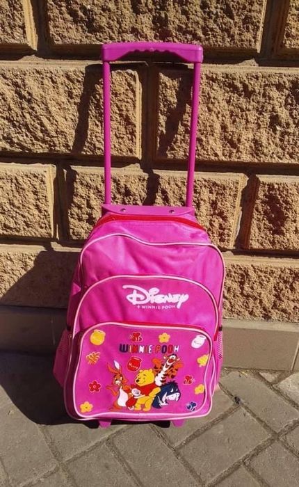 Дитячий рюкзак на колесах для дівчинки