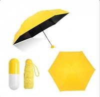 Компактна парасолька в капсулі-футлярі. Жовтого кольору.