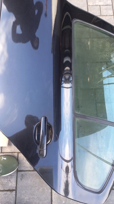Skoda Octavia 2 04-08 drzwi tylne lewe lewy tyl liftbeck czarne 9910