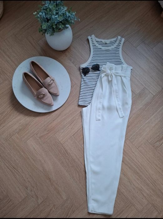 Chinosy śmetankowe roz.40