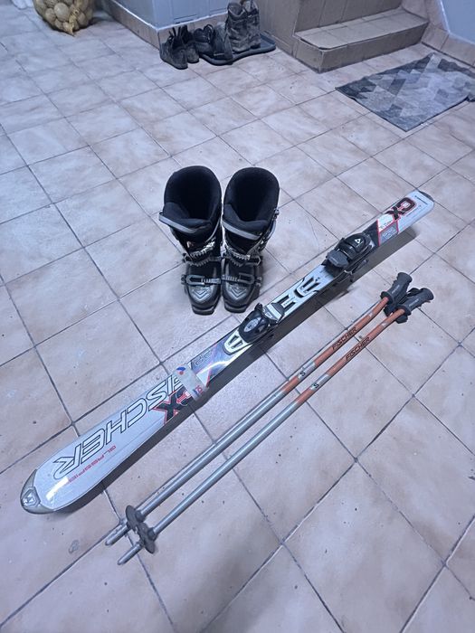 Sprzedam Narty Fisher z kijkami i butami
